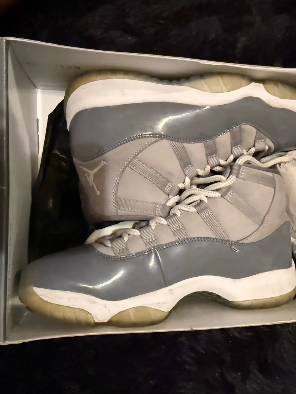 Jordan Retro 11 High-Top Sneakers in Grey and White